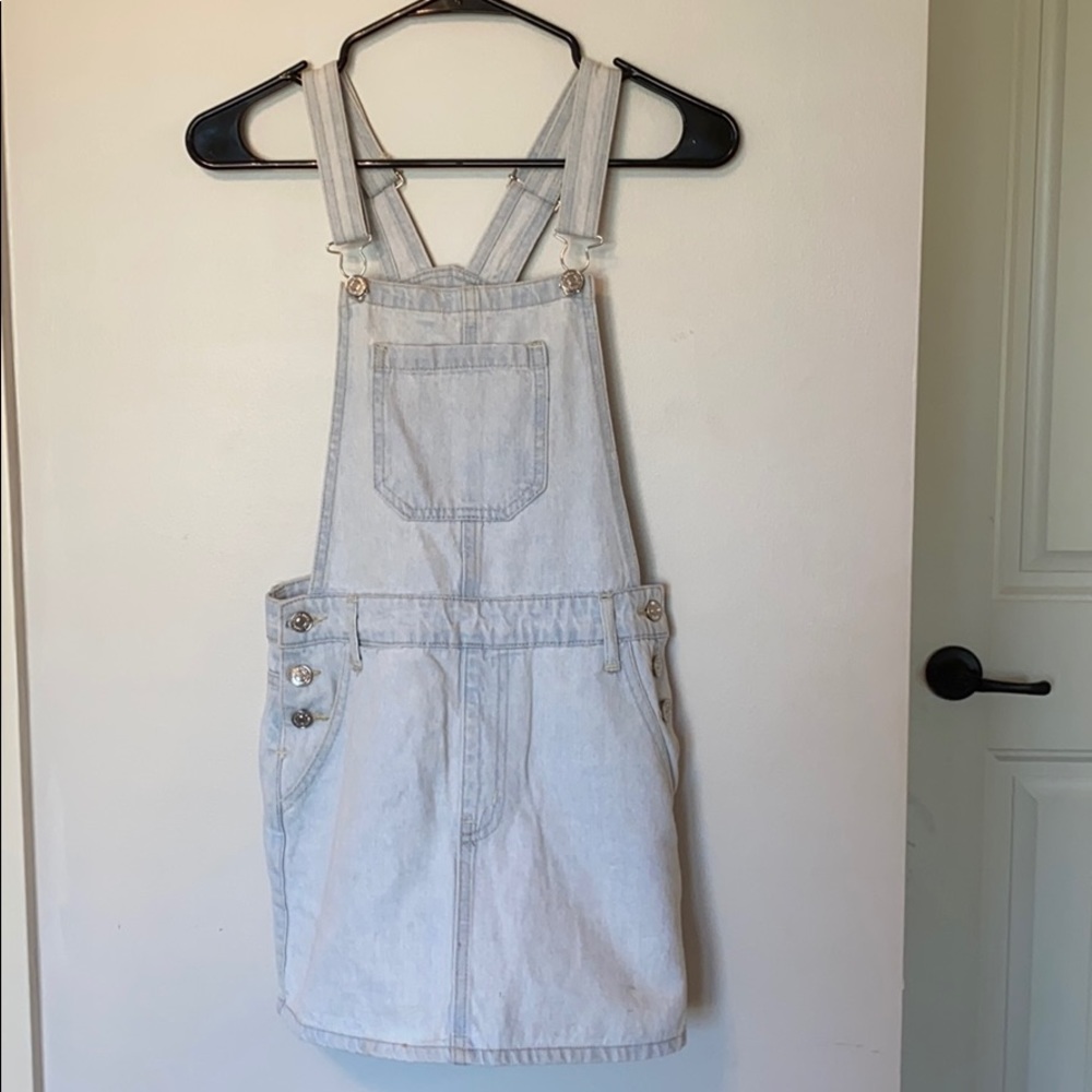 Light denim overall skirt with buttons and pockets